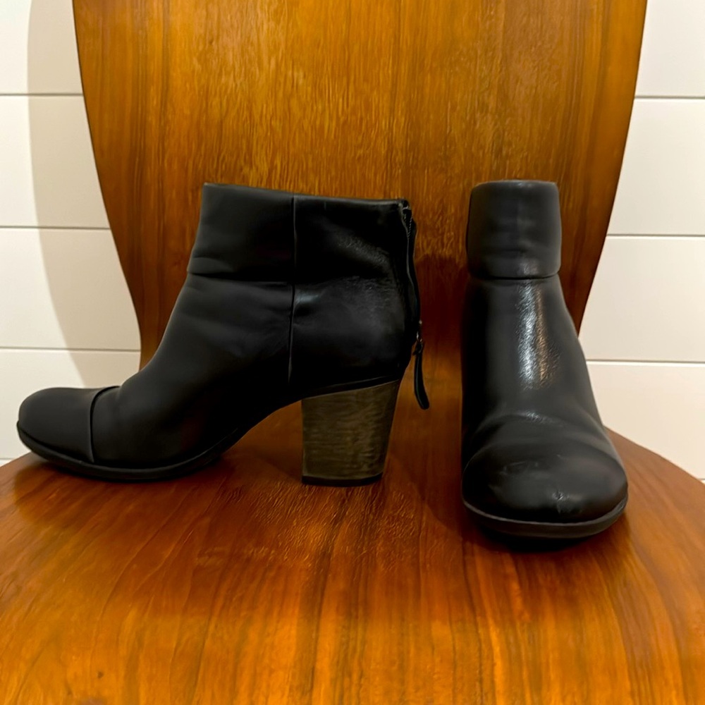 Clarks Black Ankle Boots with Sleek Design and Subtle Heel